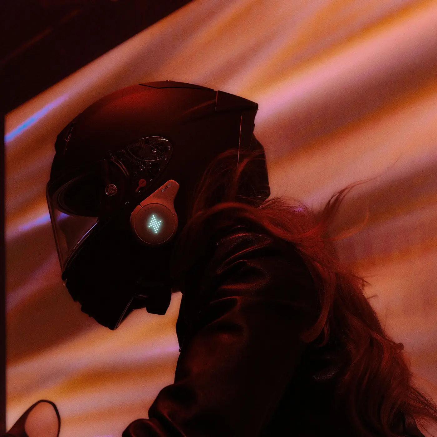 Helmet with the Rogue LED matrix lit under warm light streaks